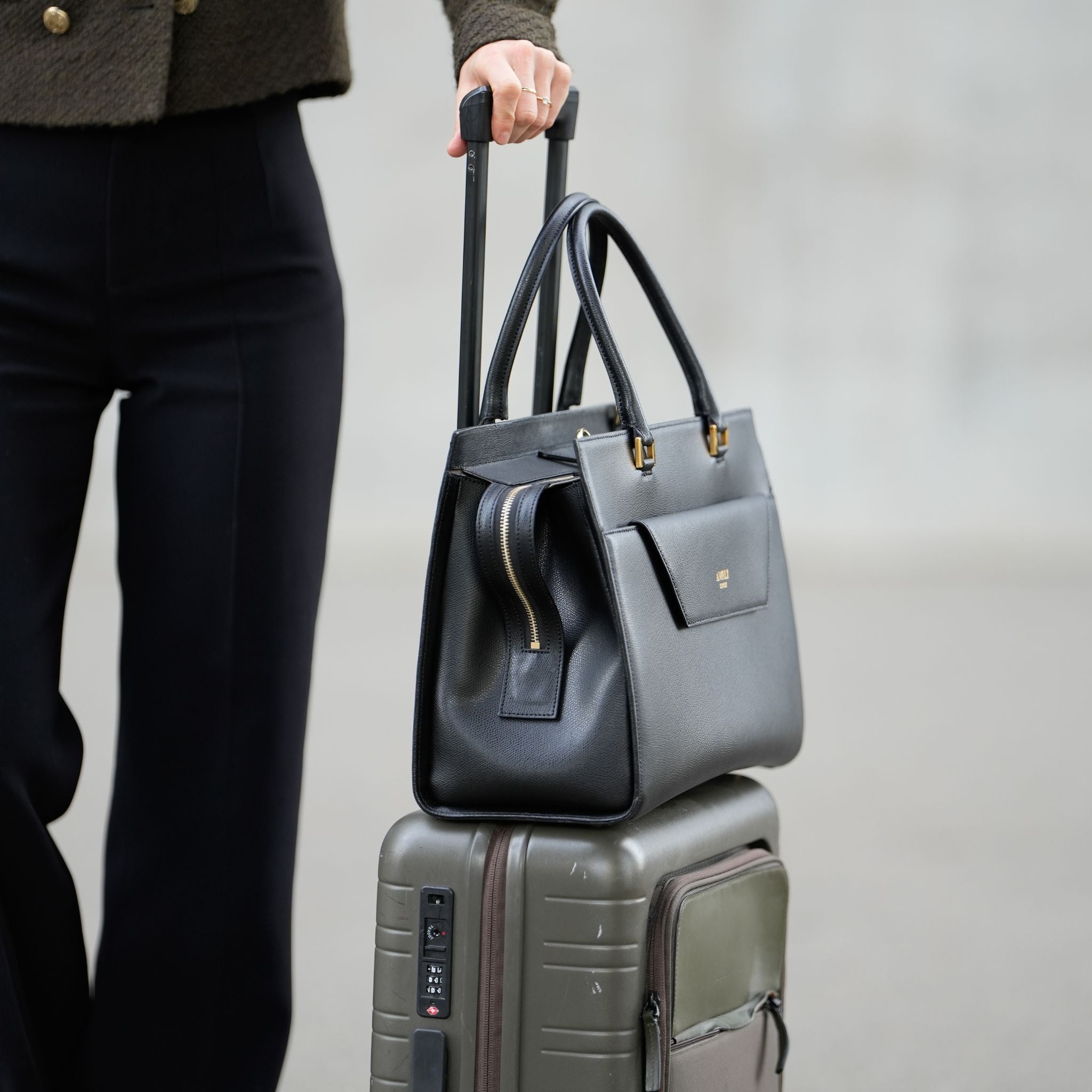 AMELI Zurich | CENTRAL | Greige | Pebbled Leather | On the suitcase