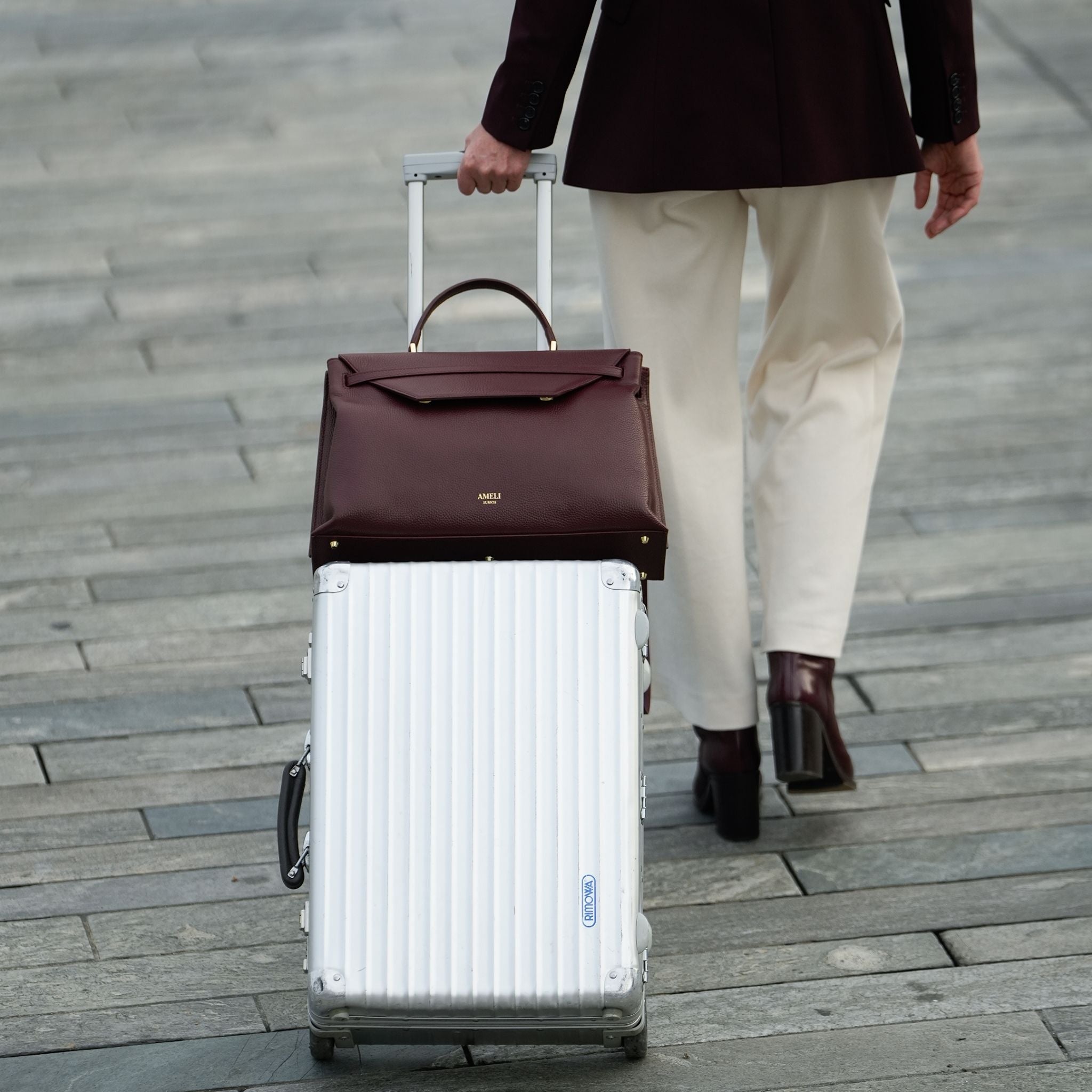 AMELI Zurich | VIADUKT WORK 24 | Maroon Red | Dollarino Leather | On the suitcase